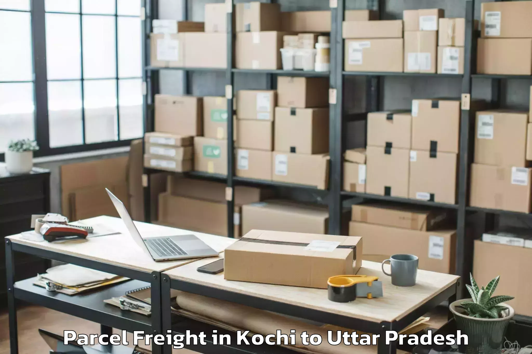 Easy Kochi to Auraiya Parcel Freight Booking